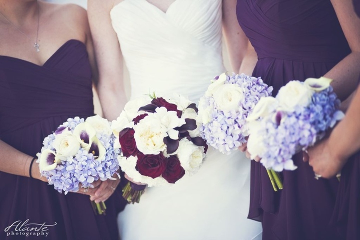 The Centerpieces Lavender hydrangea white lisianthus deep red roses 